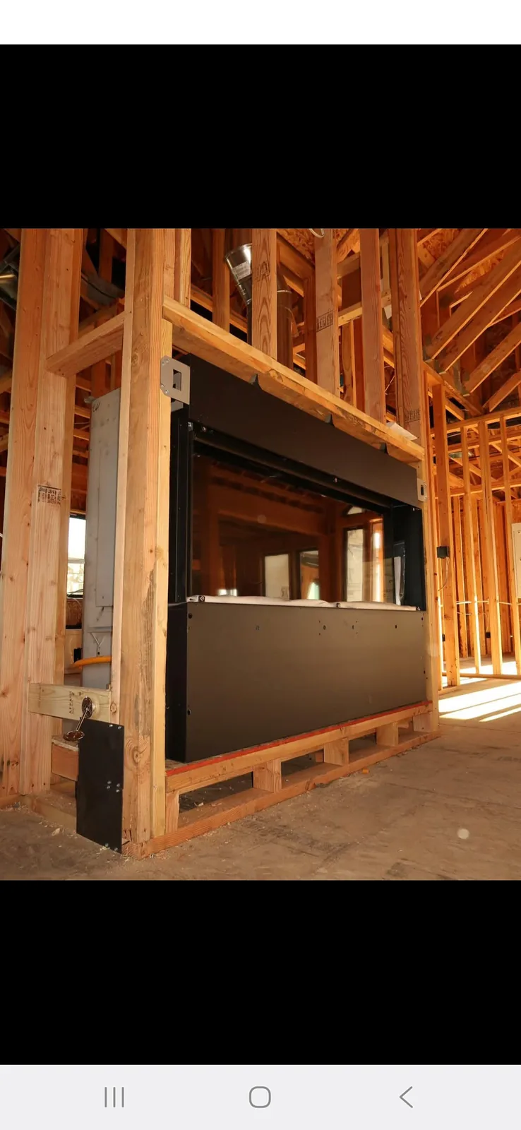 Zero clearance fireplace installation during framing Zero clearance fireplace installation during framing